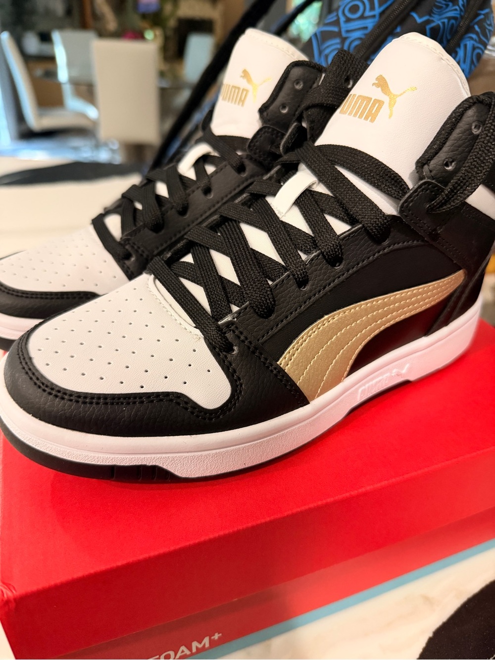 NWT Never worn Puma  Black/ White/Gold Rebound Layup Sneakers Youth